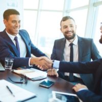 Start a New Career Path as an MLO happy businessmen handshaking