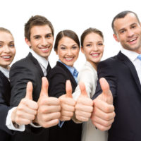Nuances On Getting A Real Estate Brokers License group of thumbing up business people, isolated on white. concept of teamwork and cooperation
