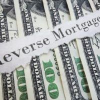 reverse mortgage paper message on assorted cash