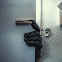 masked burglars breaking and entering into a victim's home
