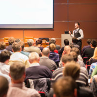 Speaker at Business Conference and Presentation. Audience at the conference hall. Business and Entrepreneurship.