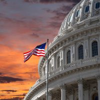 Sunset sky over the US Capitol building dome in Washington DC